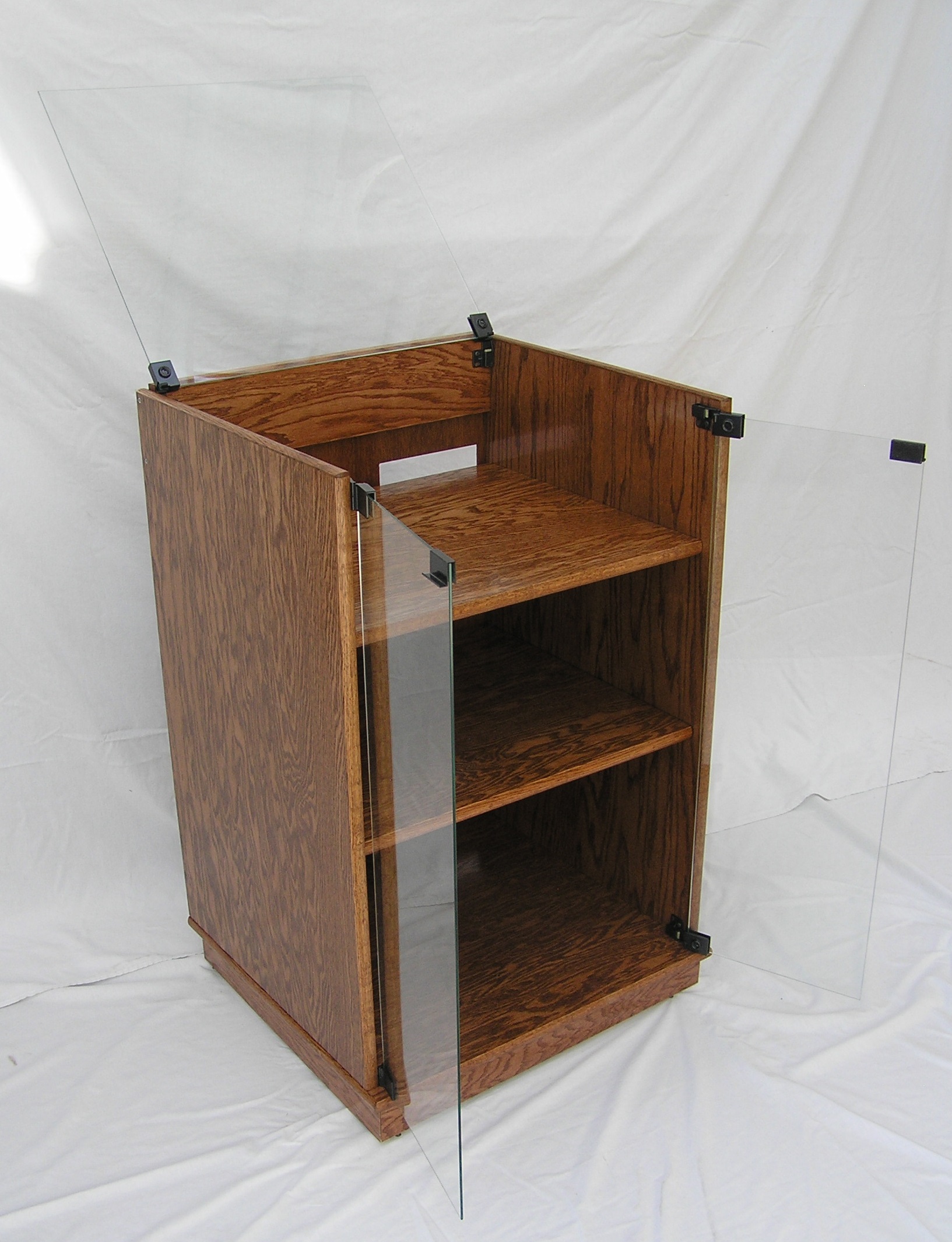 SC2230G entertainment center. Open clear glass top and doors in Minwax English Chestnut.