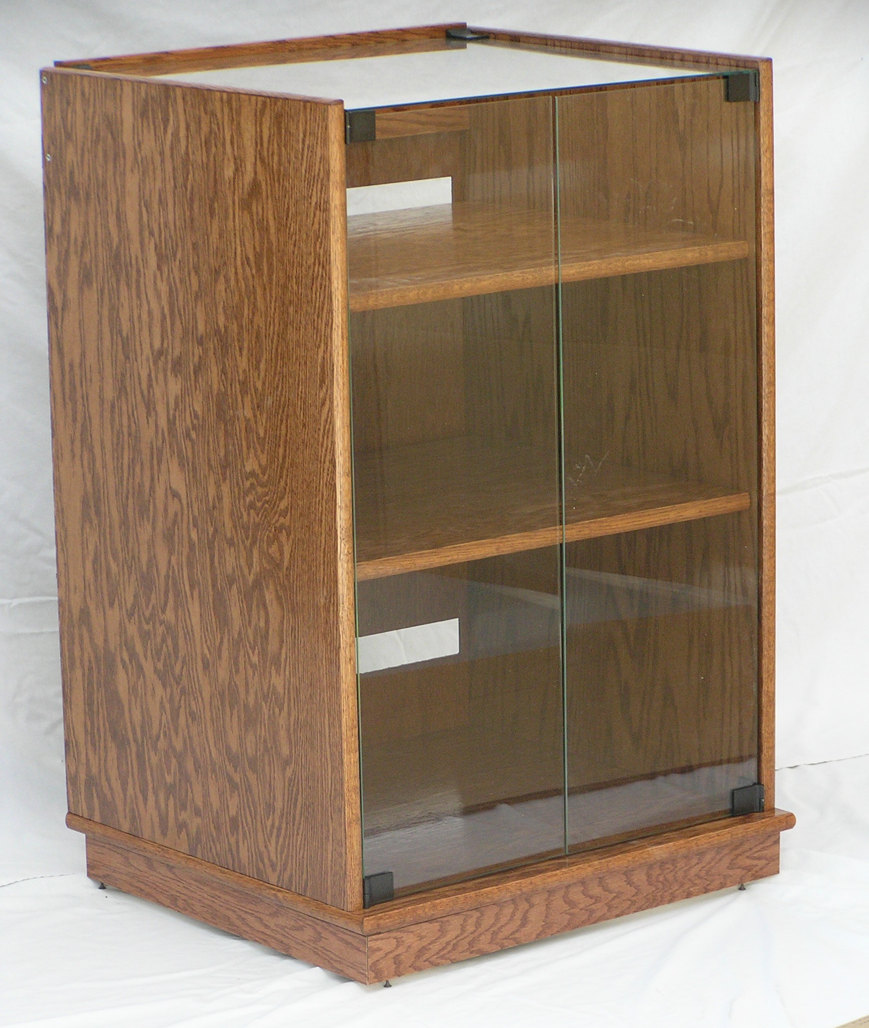 SC2230G. Clear glass top and doors in Minwax English Chestnut.