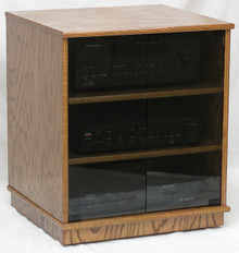 Stereo rack 27" high with glass doors. Shown in Minwax Special Walnut stain color and gray tint tempered glass doors.  2 adjustable shelves standard.  http://www.decibeldesigns.com 888.850.5589