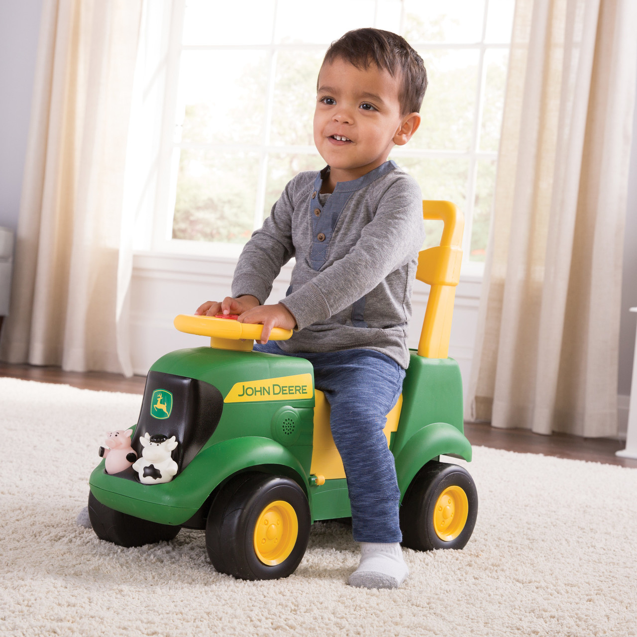 john deere sit n scoot activity tractor