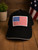 BLACK CAP WITH WHITE TRIM AND EMBROIDERED FLAG PATCH