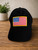 BLACK CAP WITH EMBROIDERED FLAG PATCH OUTLINED IN YELLOW
