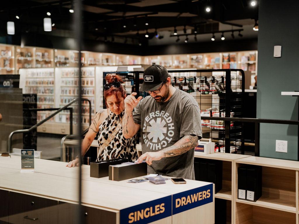 Customers checking out the singles drawers