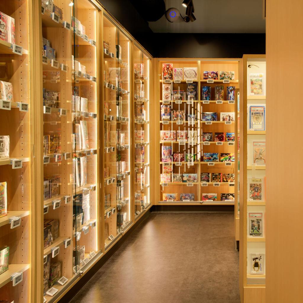 Dozens of showcases full of sealed wax and singles