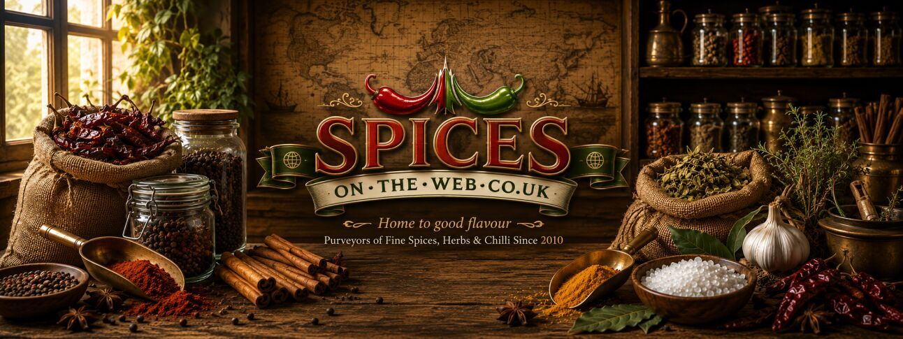SPICESontheWEB homepage banner featuring spices, herbs, chilli, glass jars, burlap sacks and brass scoops in a traditional spice merchant setting.