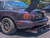 Picture of a rear tow hook on an NA Miata with a diffuser.