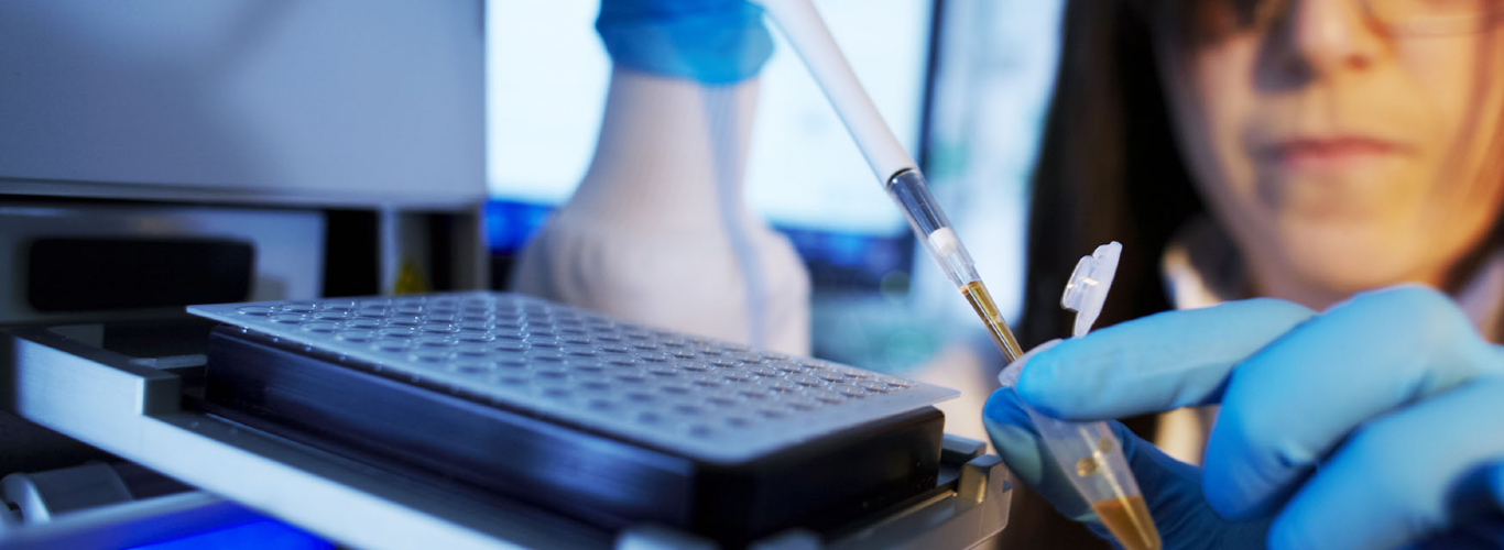 Scientist completing multiplex testing in a laboratory.