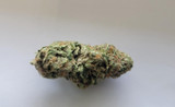 Enjoy the Tropical, Citrusy Notes of THC-A Flower 1/8oz Green Crack