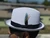 White Stingy Brim Milano pictured with brim flipped up
