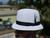White Stingy Brim Milano pictured with brim flipped down