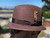 Brown Stingy Brim Milano pictured with brim flipped down