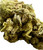 A close-up shot of the Ripkitty Mendo Breath THCA Flower, focusing on the intricate trichome coverage. The bright green and yellowish hues are prominent, and the texture looks rich and sticky, indicating high potency. The trichomes are glistening, making the bud look like it’s coated in sugar crystals.