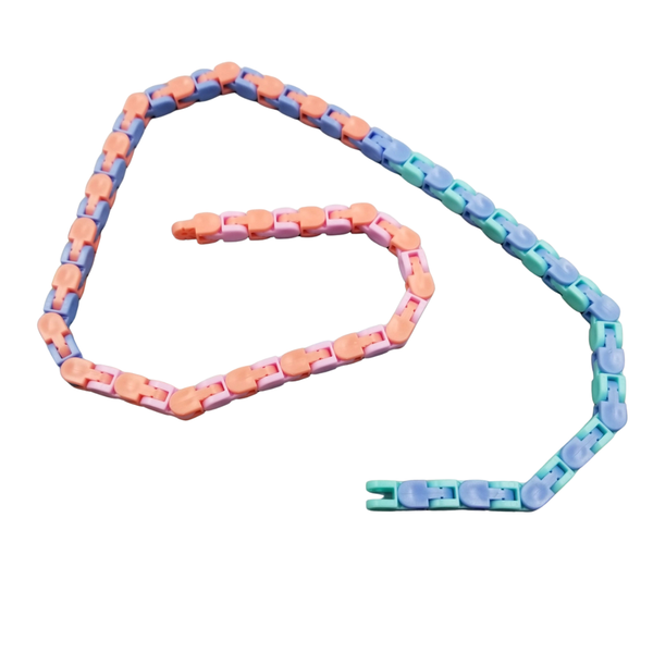 One multi-colour snap track fidget toy laying on its side