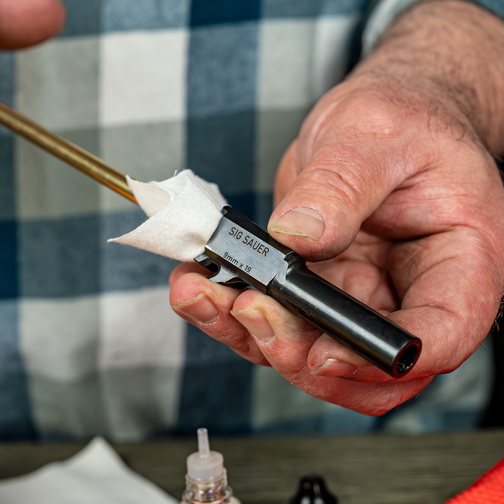 Lifestyle image of  Shooter's Choice Universal Gun Cleaning Kit in use