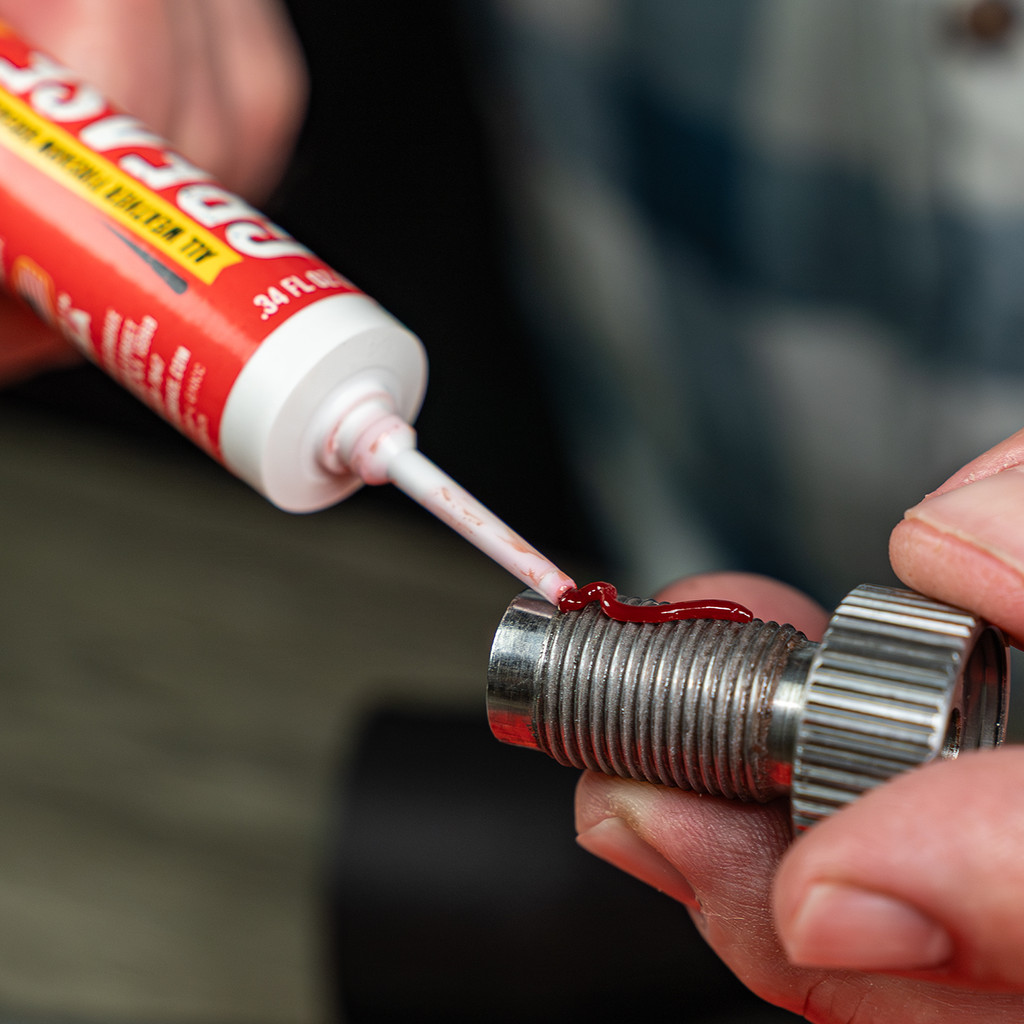  Lifestyle Image of Shooter's Choice Muzzleloader Cleaning Accessory Pack high temp grease in use on a muzzleloader breech plug threads