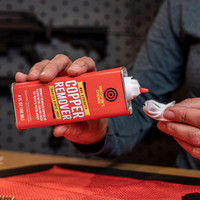 product image Shooter's Choice Maximum Strength Copper Remover in use being applied to a gun cleaning patch