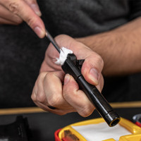 Lifestyle image of image of Shooter's Choice .40 caliber Pistol Cleaning Kit shown in use