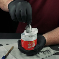 Lifestyle image of Shooter's Choice Firearm Small Parts Soaker 4oz shown in use