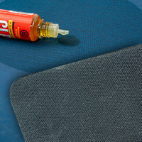 Llifestyle image of Shooter's Choice Gun Cleaning Mat demonstrating oil resistance 