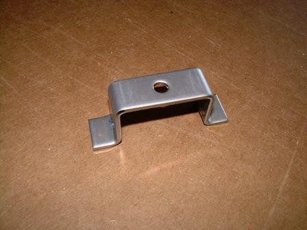 BRACKET, HINGE GUARD FOR FOLD DOWN LOVESEAT CHAISE