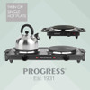 Black Progress electric hot plate with saucepan and frying pan cooking mixed vegetables.