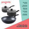 Set of three black saucepans with glass lids on kitchen worktop, food inside each pan