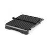 Black electric grill open flat, showing double ridged cooking plates