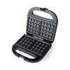 Black waffle maker with open lid, showing non-stick cooking plates.