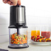 Progress electric food chopper with diced vegetables in bowl, shown on kitchen counter