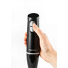 Black handheld blender handle close-up showing turbo button