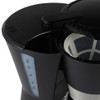 Black filter coffee maker with open lid, showing water gauge and filter basket