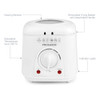 Mini deep fryer with cooked chicken pieces, surrounded by fried food on chopping boards