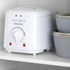 White electric deep fryer with temperature dial on kitchen shelf