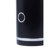 Close-up of black electric milk frother with silver power button and trim