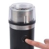 Black electric coffee grinder with stainless steel top, finger pressing power button
