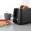 Black two-slice toaster with dial and buttons, shown at an angle