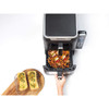 Black dual air fryer with two drawers, each filled with cooked chips, top-down view