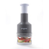 Grey Progress manual food chopper with clear base, shown filled with vegetables.