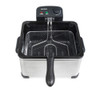 Silver deep fat fryer with black handle and control dial, shown empty from above