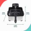 Silver deep fat fryer with baskets of chips and fried chicken on kitchen worktop