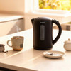 Black Progress kitchen appliances set on worktop, including kettle, toaster, coffee maker, and blender.