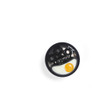 Black microwave egg poacher with one cooked egg in tray, top-down view