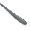 Silver dessert spoon with geometric etched pattern, angled view