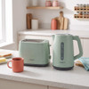 Mint green kettle and toaster set on kitchen counter