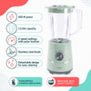Green electric jug blender with clear plastic jug, shown at an angle