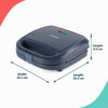 Closed navy sandwich maker on kitchen counter, bread slices beside for UK product listing