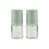 Set of two glass herb or spice storage jars with sage green lids