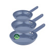 Set of three blue non-stick frying pans, PFAS free, shown stacked side by side.