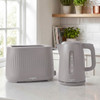 Grey kettle and toaster set with textured design on kitchen counter