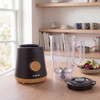 Black and wood effect jug blender base, clear jug and lid shown separately on kitchen worktop